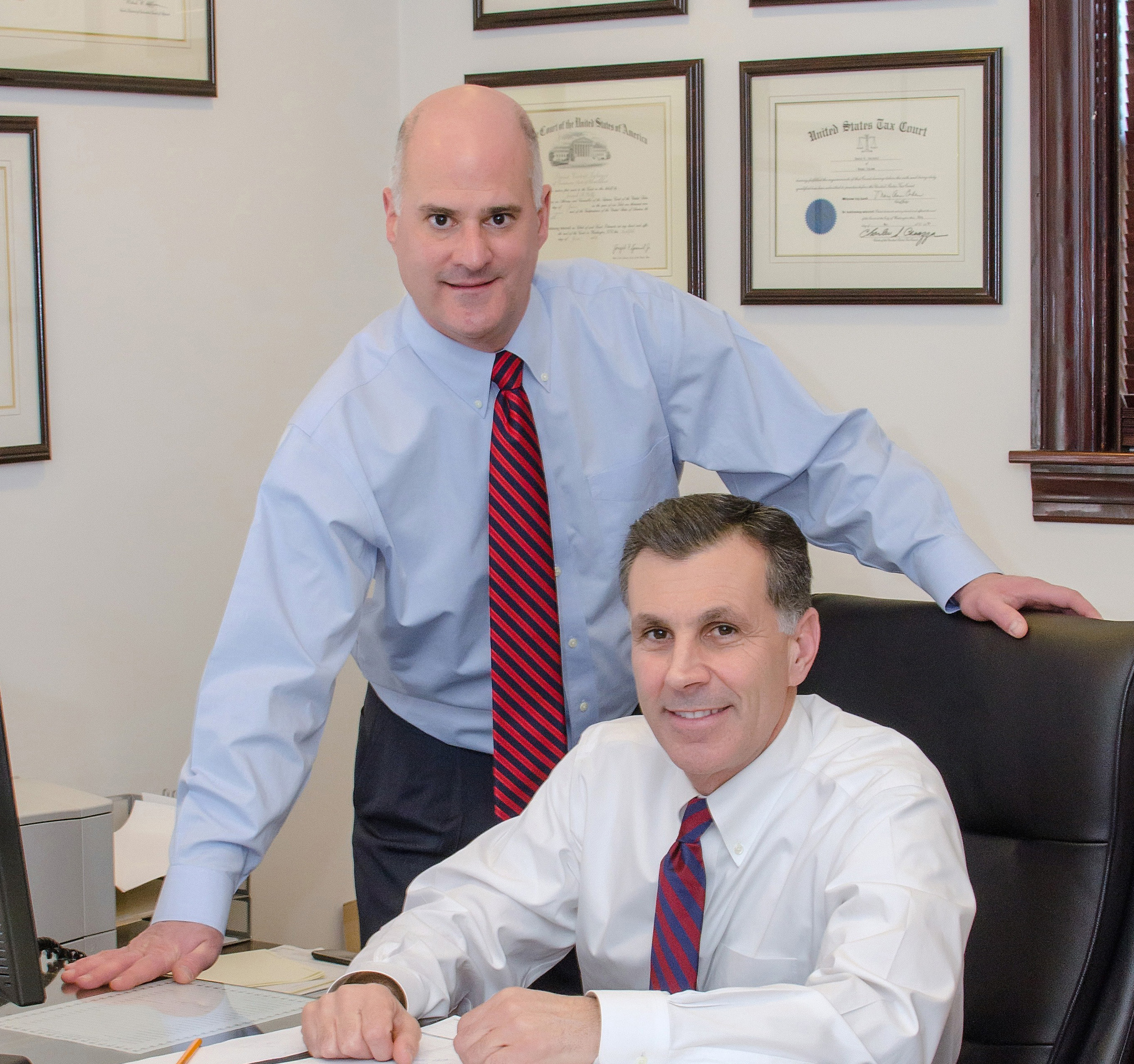 John F. Reis, Esq., CPA and David V. Igliozzi, Esq.